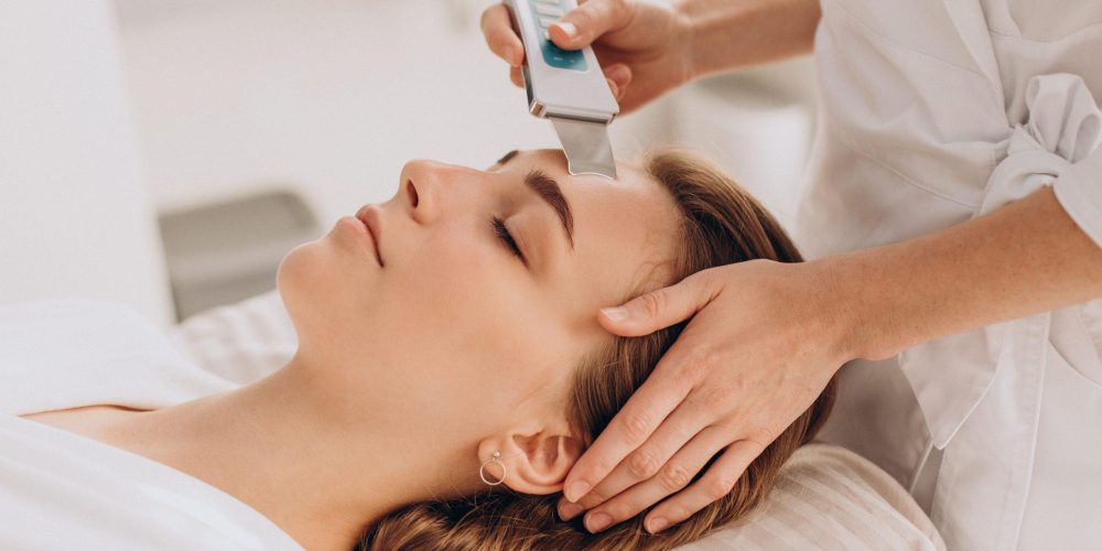 Woman having beauty treatment procedures ina salon